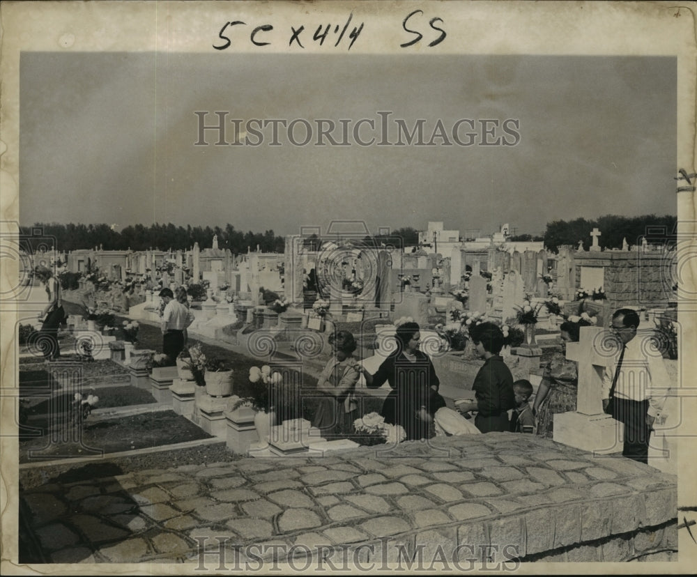 1964 All Saints Day, New Orleanians at Greenwood cemetery-Historic Images