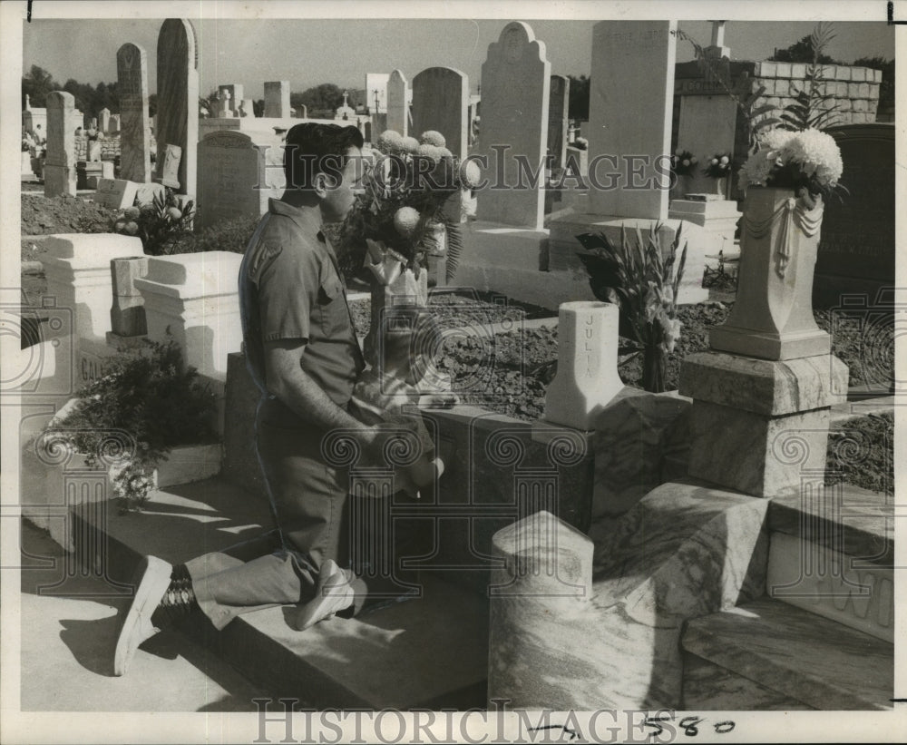 1968 All Saints Day - Philip Fielding and son at Greenwood Cemetery. - Historic Images