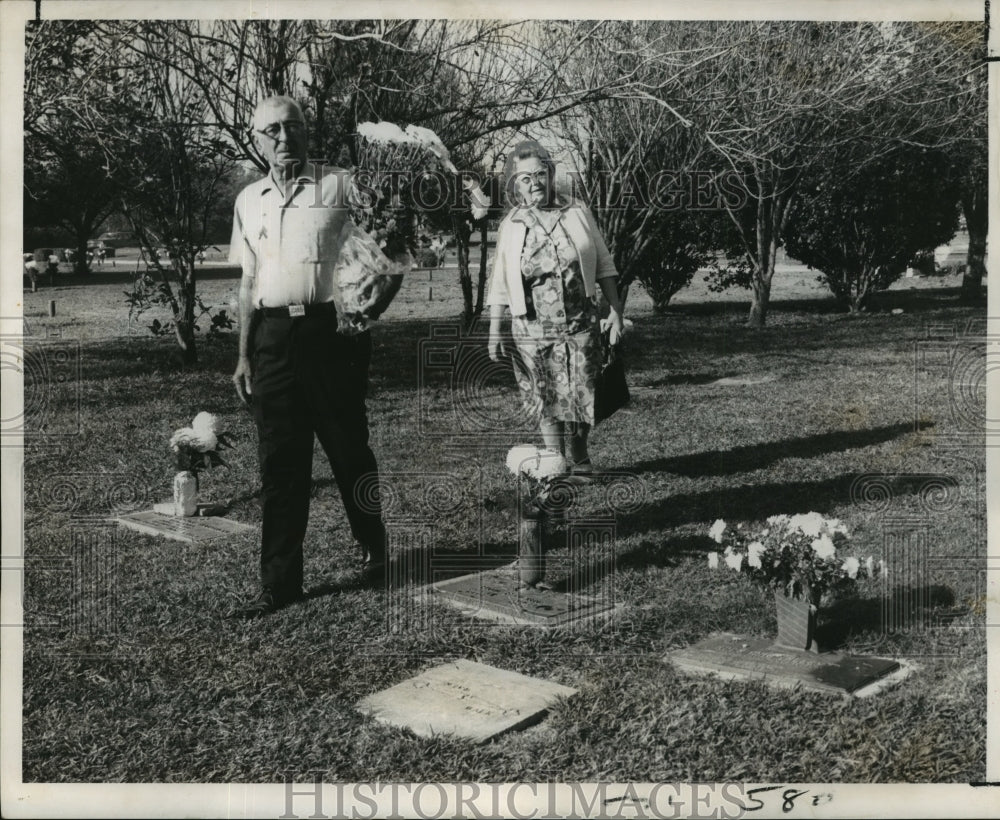 1968 All Saints Day - Mr. &amp; Mrs. Percy Guillory visiting grave. - Historic Images