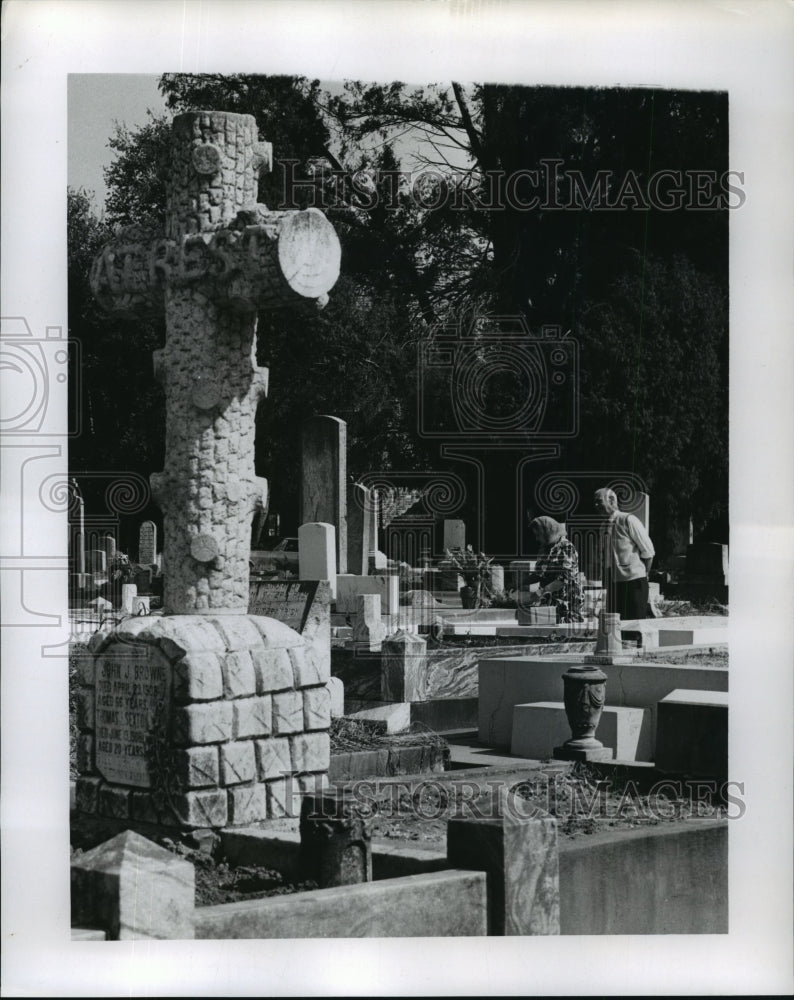 1966 All Saints Day, people walk through St. Louis Cemetery - Historic Images