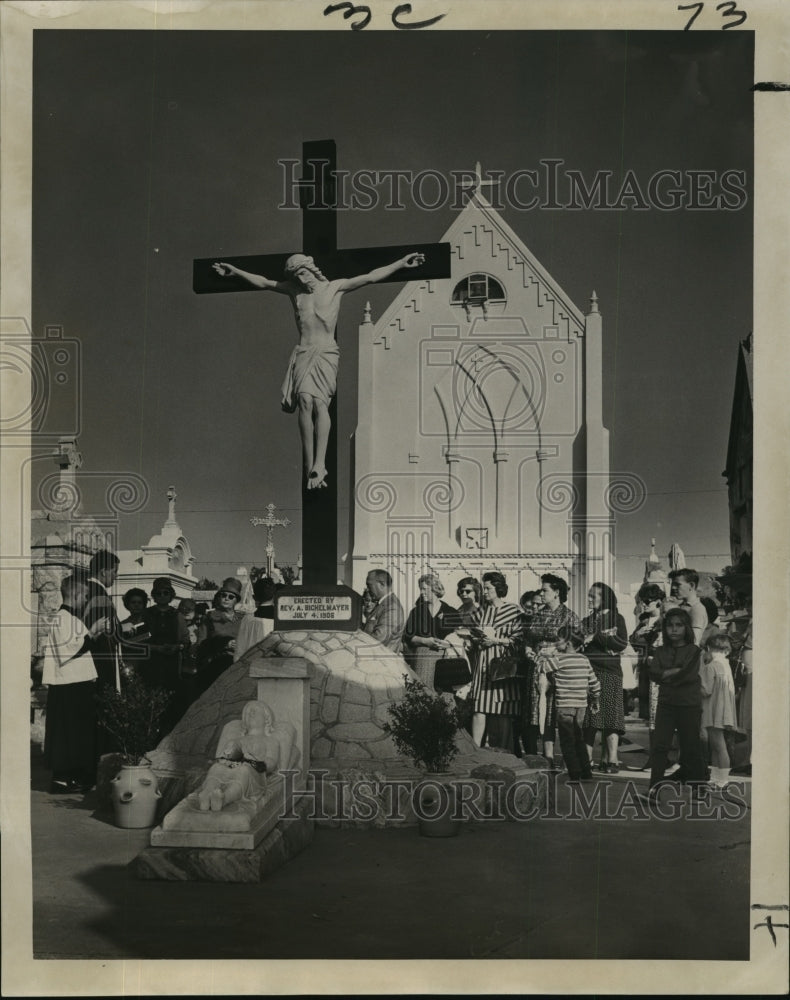 1965 All Saints Day, stone crucifix near chapel in St. Roch Cemetery - Historic Images