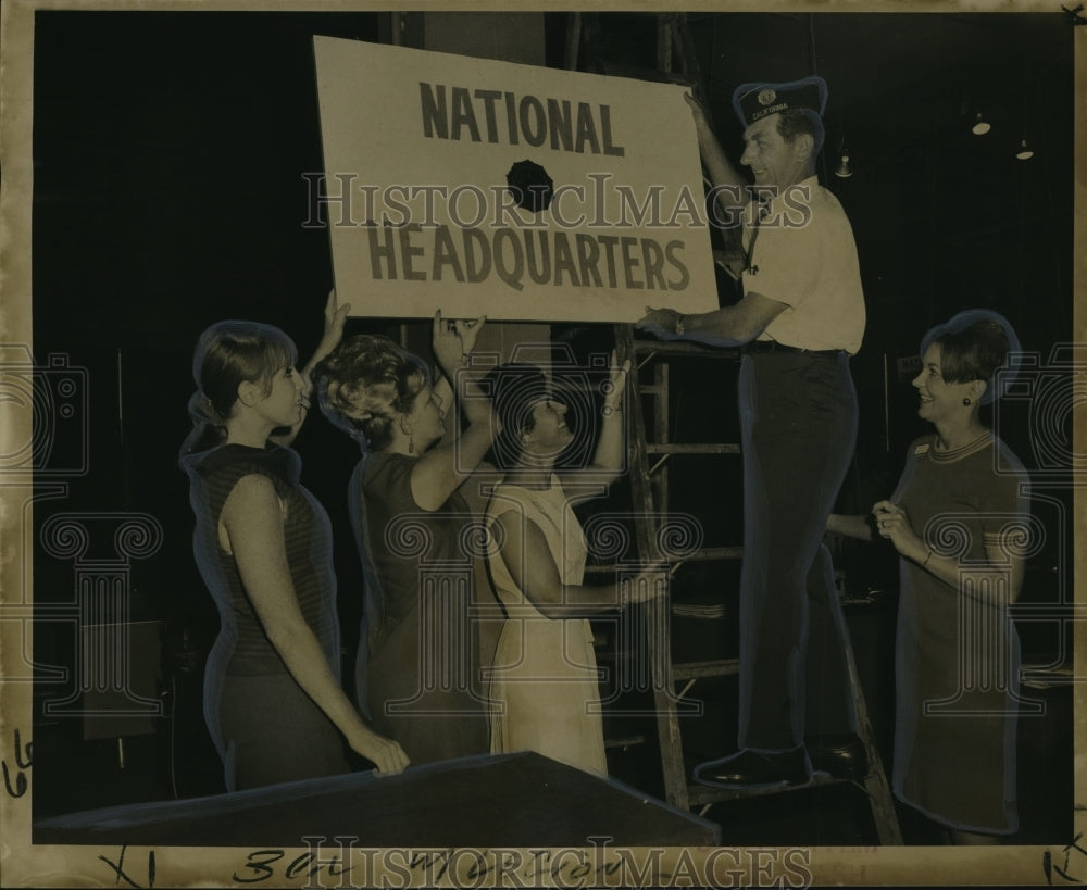 1968 Press Photo Ray Macdouall and ladies installing sign Municipal Auditorium - Historic Images