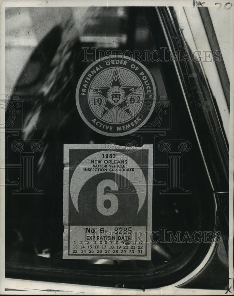 1963 Press Photo June Brake Tags on a Policeman's automobile - Historic Images