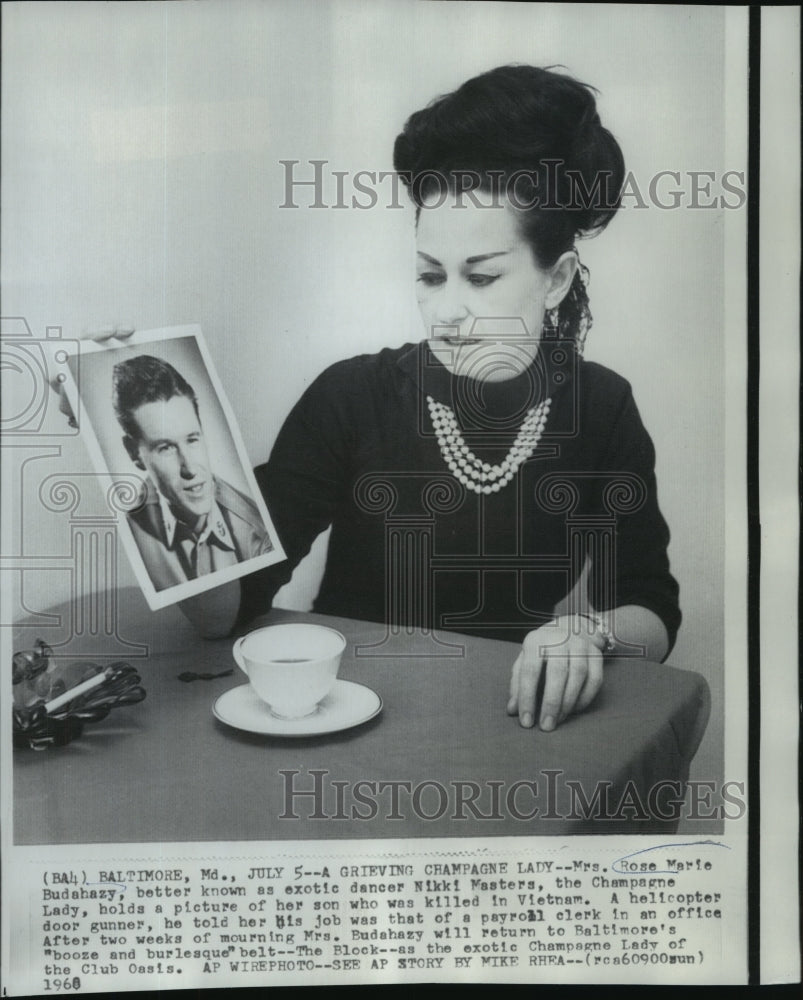 1968 Grieving Mrs. Rose Marie Budahazy holds photo of her son - Historic Images