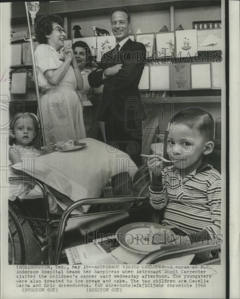 1966 Nurse beams as Scott Carpenter visited children&#39;s cancer ward - Historic Images