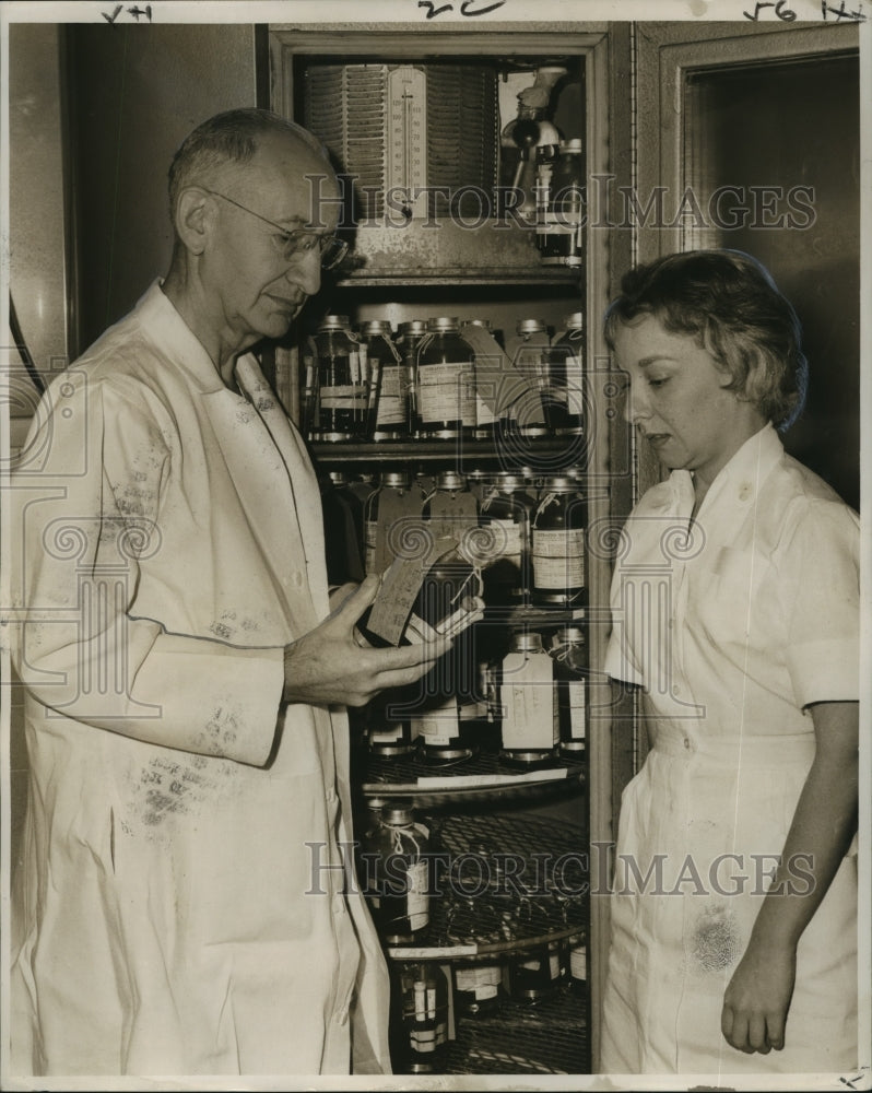 1963 Press Photo Dr. John Adriana &amp; Miss Connie Dupuy of Charity blood bank-Historic Images