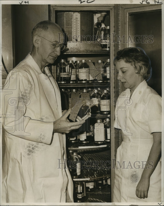 1963 Press Photo Dr. John Adriana & Miss Connie Dupuy of Charity blood bank-Historic Images