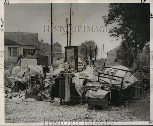1963 Press Photo Pile of Furniture and Clothing of Mrs. John L. Colas on Road-Historic Images