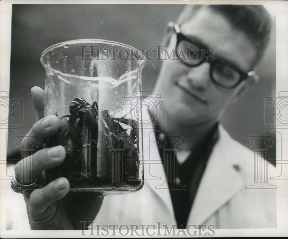 1966 Allen Comecla shown with a beaker of crawfish - Historic Images