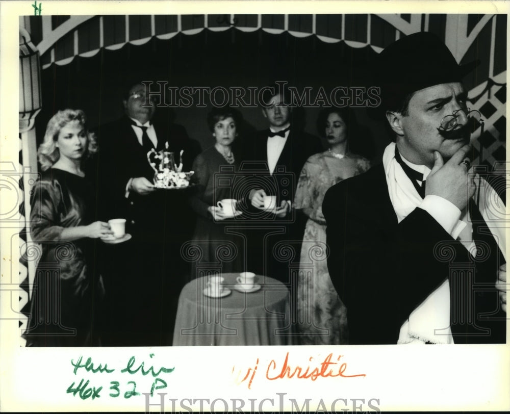 1991 Richard H. Mueller, II ponders whodunit in Black Coffee Play - Historic Images