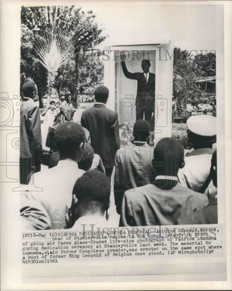 1961 Antoine Gizenga Stands in front of Patrice Lumumba Memorial - Historic Images