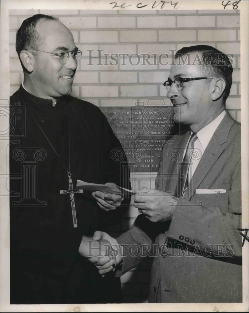 1959 Press Photo Claude Marquette presents a check to principal Brother Flavian- Historic Images