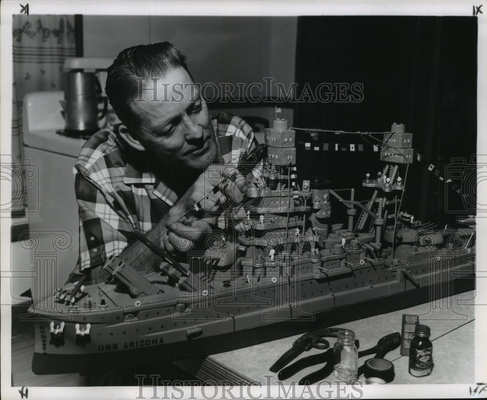 1961 Press Photo Steet Car Conductor Mire Cordes Works on Model Boat USS Arizona - Historic Images