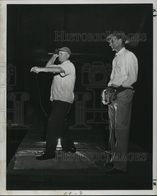 1951 Carl Hulseman whips line at Crescent City Fly Casting contest - Historic Images