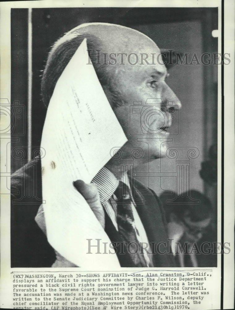 1970 Press Photo Senator Alan Cranston with an affidavit at a news conference - Historic Images