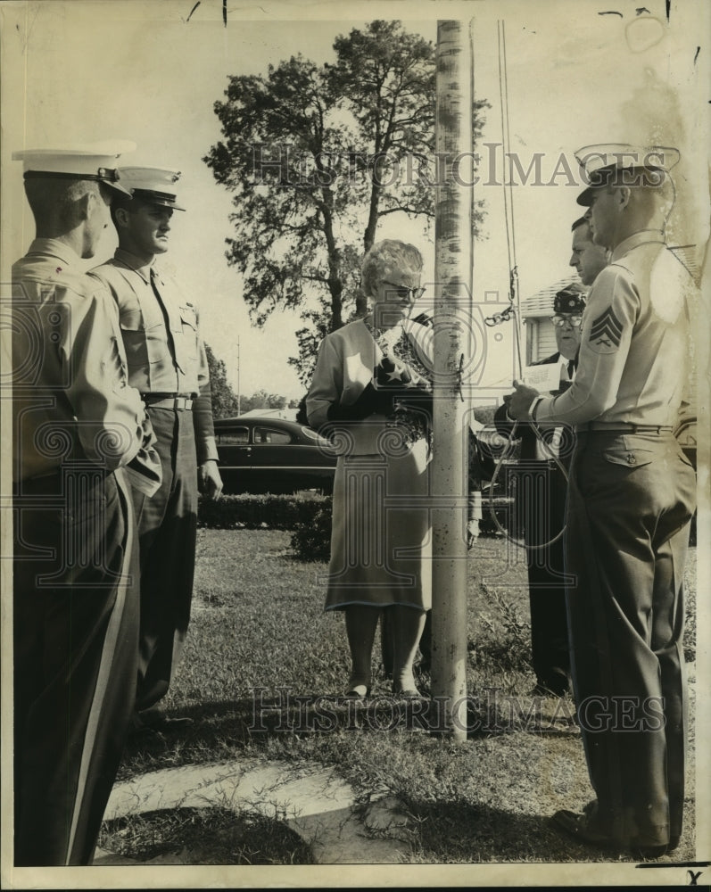 1964 Press Photo Widow Mrs. Eugene Dakin Presents Flag at Police Academy-Historic Images