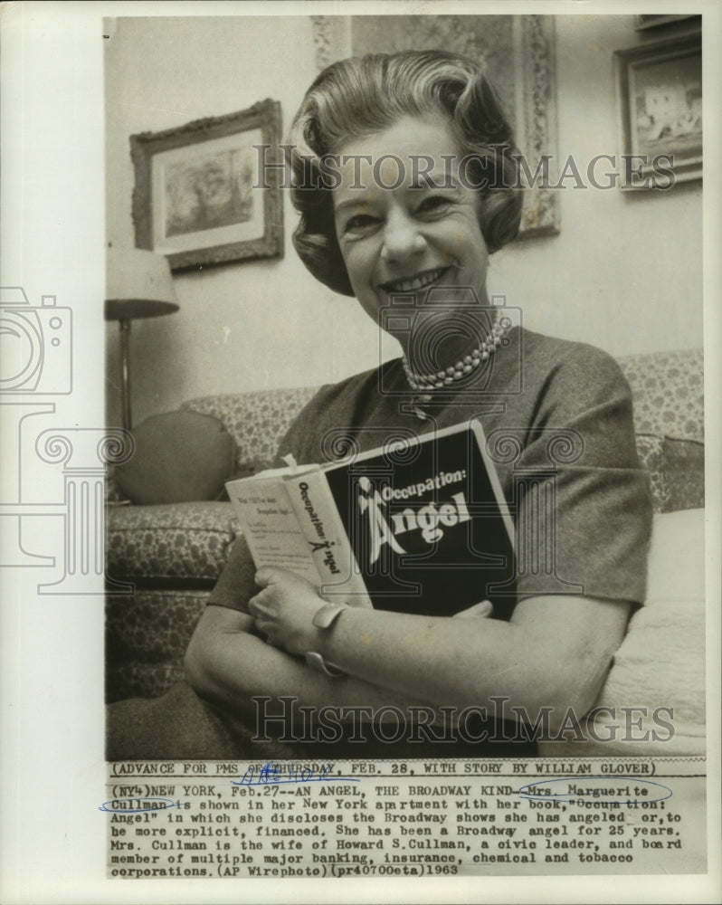 1963 Press Photo Marguerite Cullman holds book she authored in her New York home-Historic Images