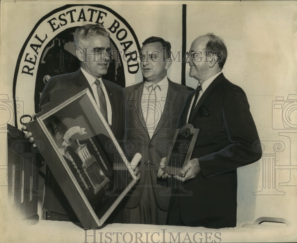 1968 Keith Hardie presented award to Charles Deano. Polson looks on. - Historic Images