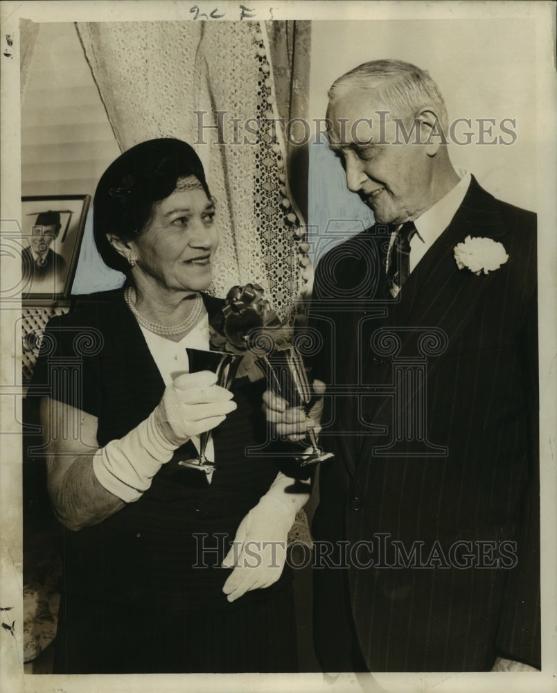 1956 Press Photo J. M. Dastugue toasts his wife, the former Suzanne Gulraud-Historic Images