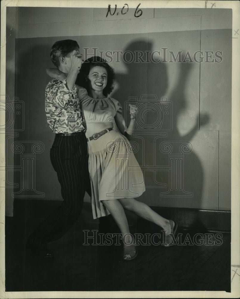 1947 Press Photo Jerry smiles as he &amp; Jules execute the Drunken Drag step - Historic Images