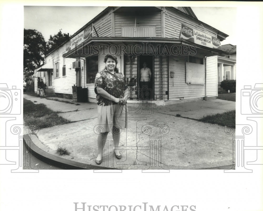 1991 America Diaz stands outside La Cubanita Grocery-Historic Images