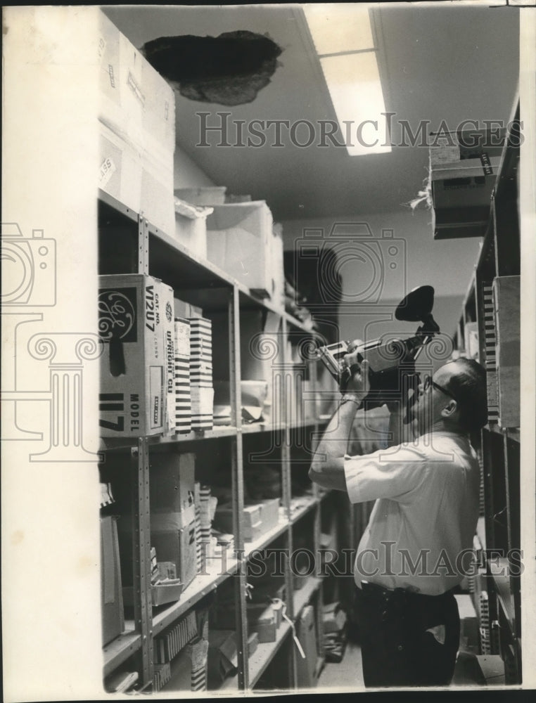 1967 Sgt. John Duff Photographs Hole Made by Burglars at Store - Historic Images