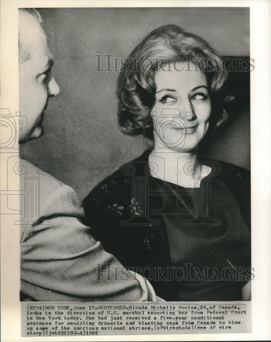 1965 Press Photo Michelle Duclos and US Marshal Leaving Federal Court - Historic Images