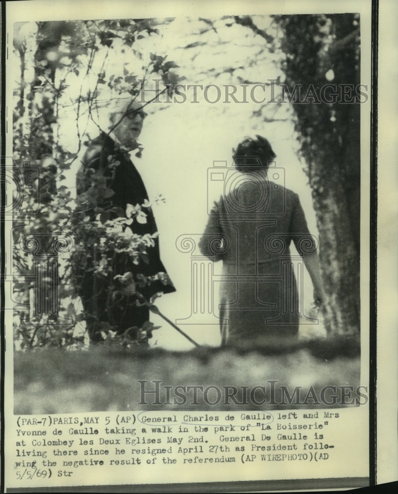 1969 General Charles de Gaulle and Mrs. de Gaulle walk in Garden - Historic Images