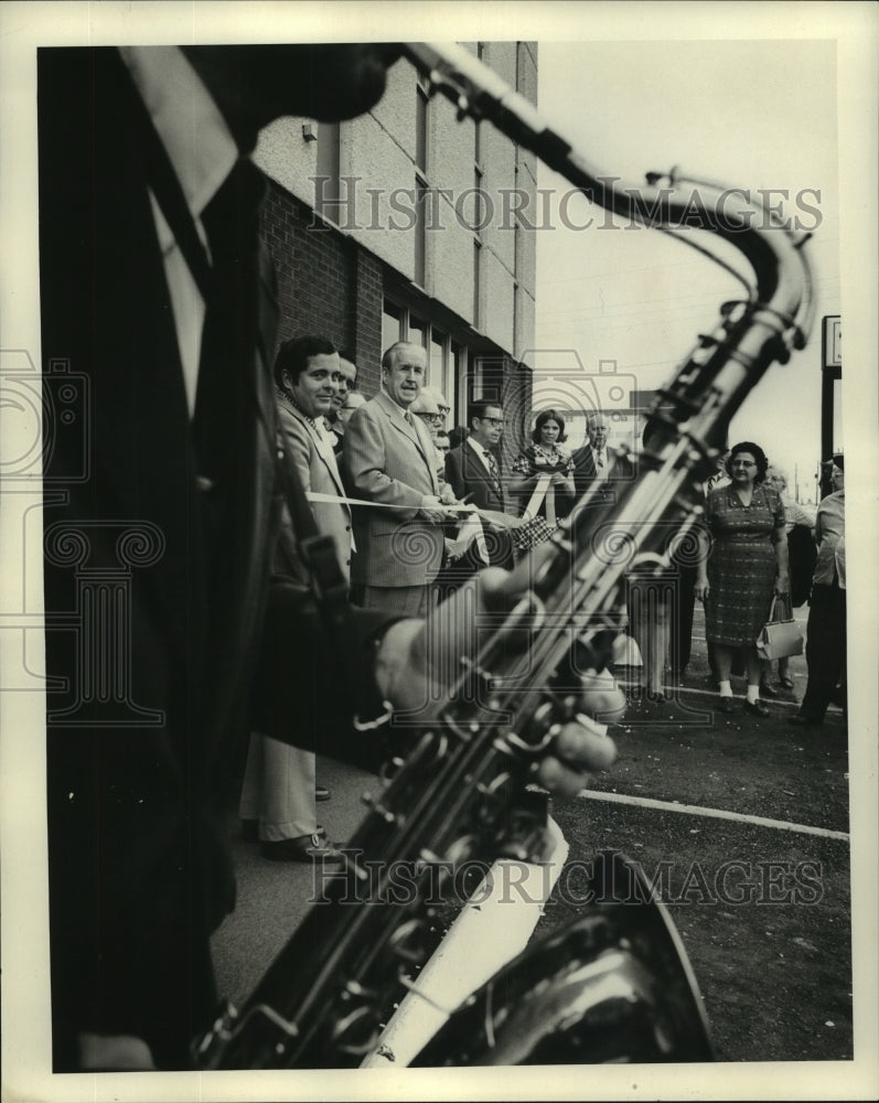 1973 Saxophone Player at Ribbon Cutting Ceremony - Historic Images