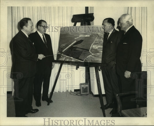 1969 Dock board members discuss purchase of property at the office - Historic Images