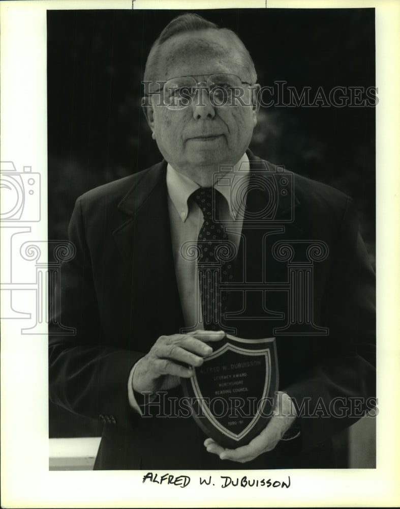 1991 Press Photo Alfred W. DuBuisson with Reading Council Literacy Award - Historic Images