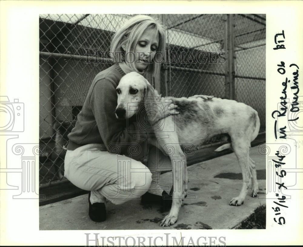 1991 Press Photo Rescue dog at animal shelter with handler. - noa94313 - Historic Images