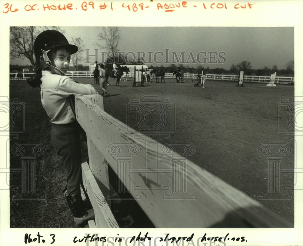 1987 Press Photo A young equestrian waiting her turn to saddle up - noa94715 - Historic Images