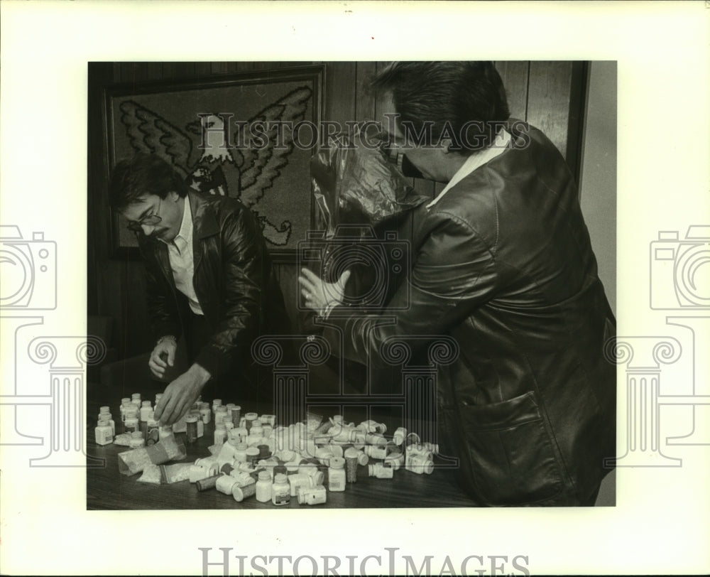 1983 Press Photo Officers shown with confiscated illegal drugs - noa94796 - Historic Images