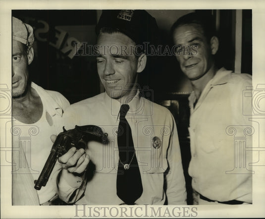 1951 Press Photo Officer Warren Donnelly & others at police morgue. - noa95023 - Historic Images