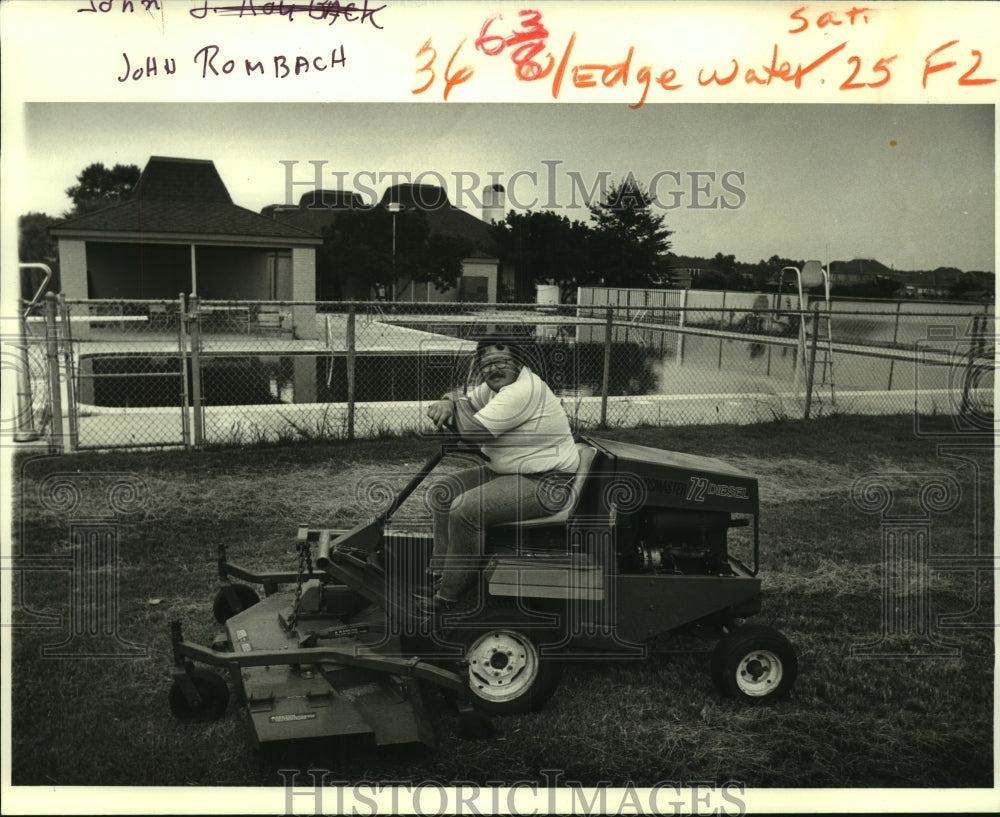 1984 Press Photo John Rombach Mows Lawn at East Edgewater Baptist Church - Historic Images