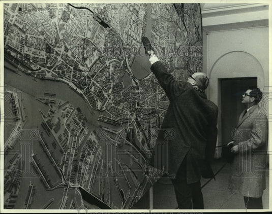 1965 Press Photo Mr. Dupuy and Mr. Kubler Look at Large Map - noa96362 - Historic Images