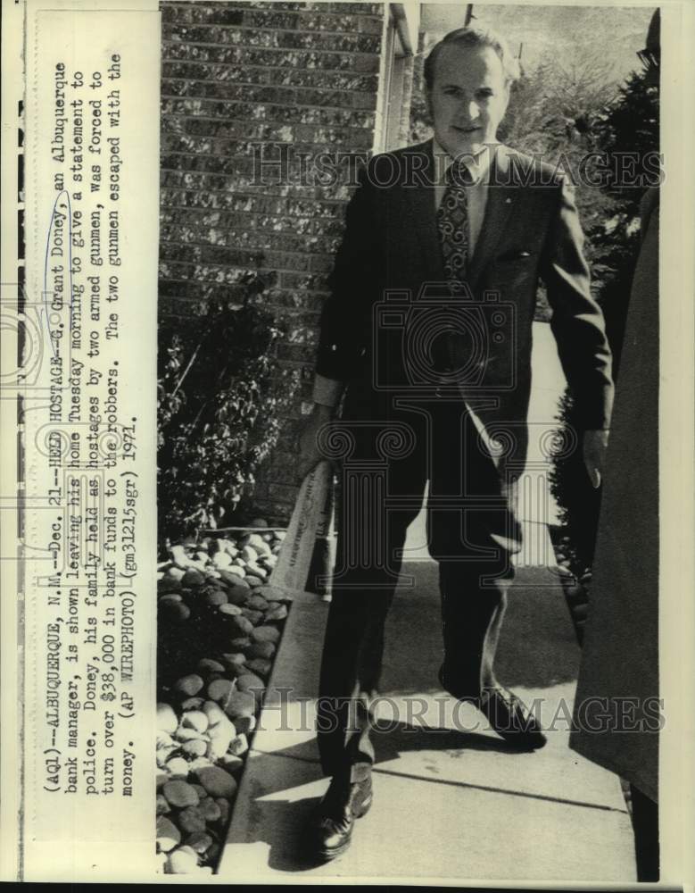 1971 Albuquerque bank manager G. Grant Doney leaves his home - Historic Images