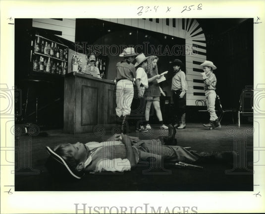 1991 Press Photo Young actor Chad Sellers lies dead, "Bobby the Varmit" in Play - Historic Images