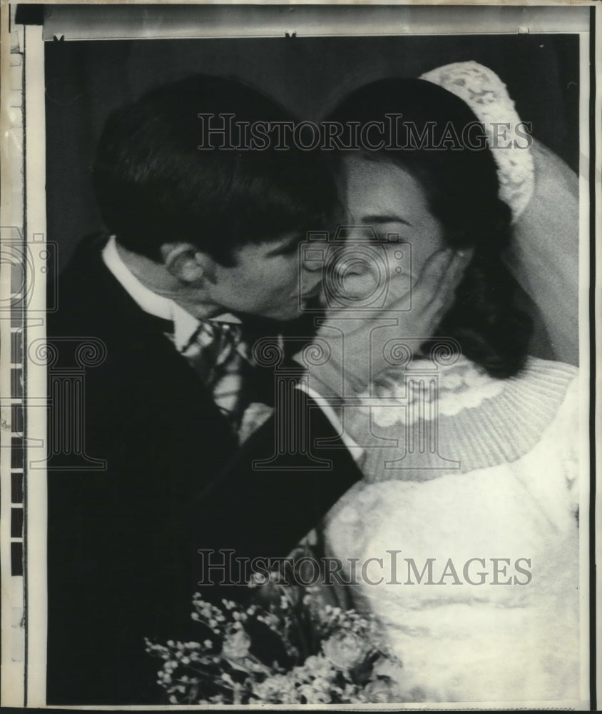 1966 David Eisenhower kisses new bride, Julie Nixon at reception.-Historic Images