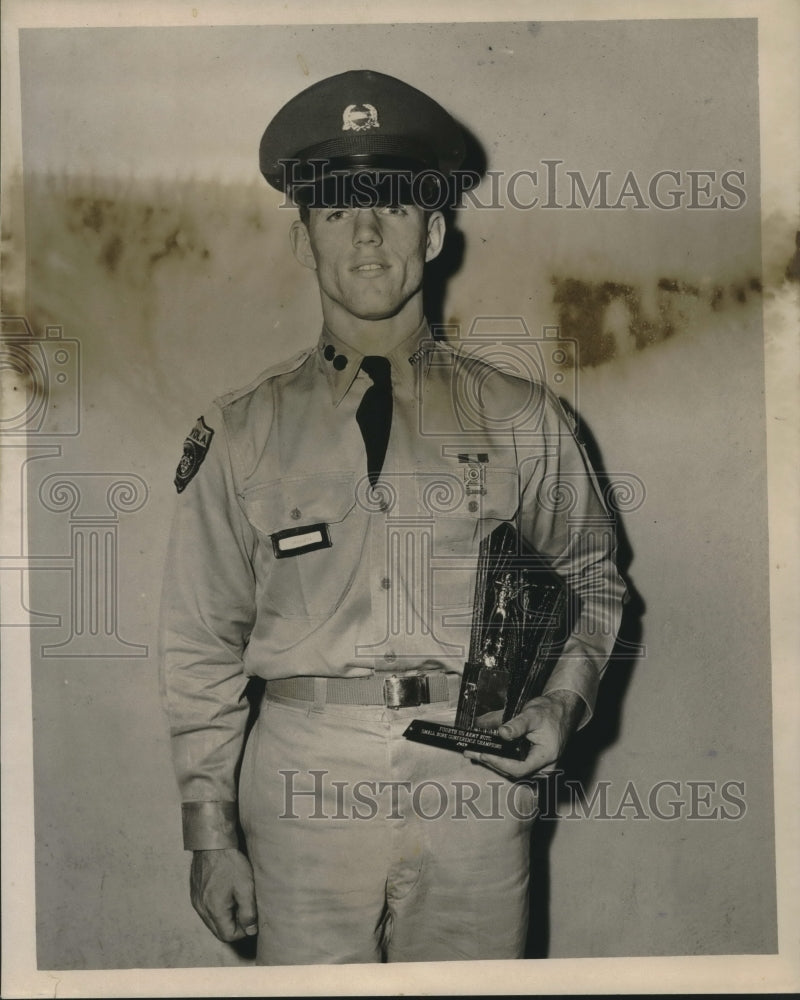 1959 Gordon Drozeski received the Loyola R.O.T.C. Rifle Trophy. - Historic Images