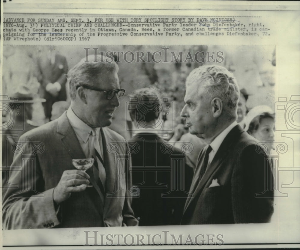 1967 Press Photo John Diefenbaker chats with George Hees in Ottawa, Canada. - Historic Images