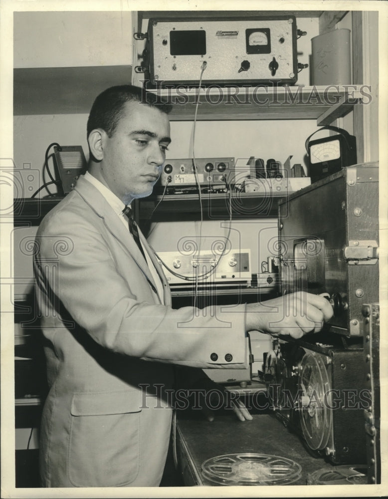 1965 Press Photo Studio Director Paul Epstein checks equipment for concert - Historic Images