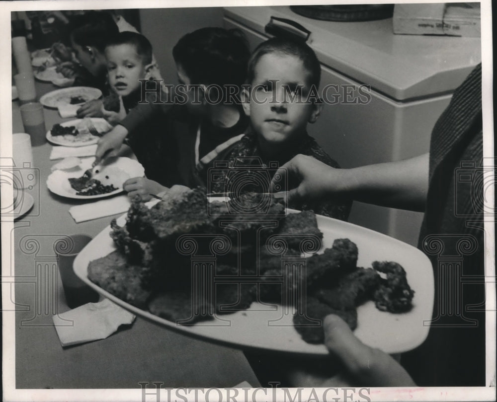 1968 Ricky is served by a volunteer helper at Fair Haven Home-Historic Images