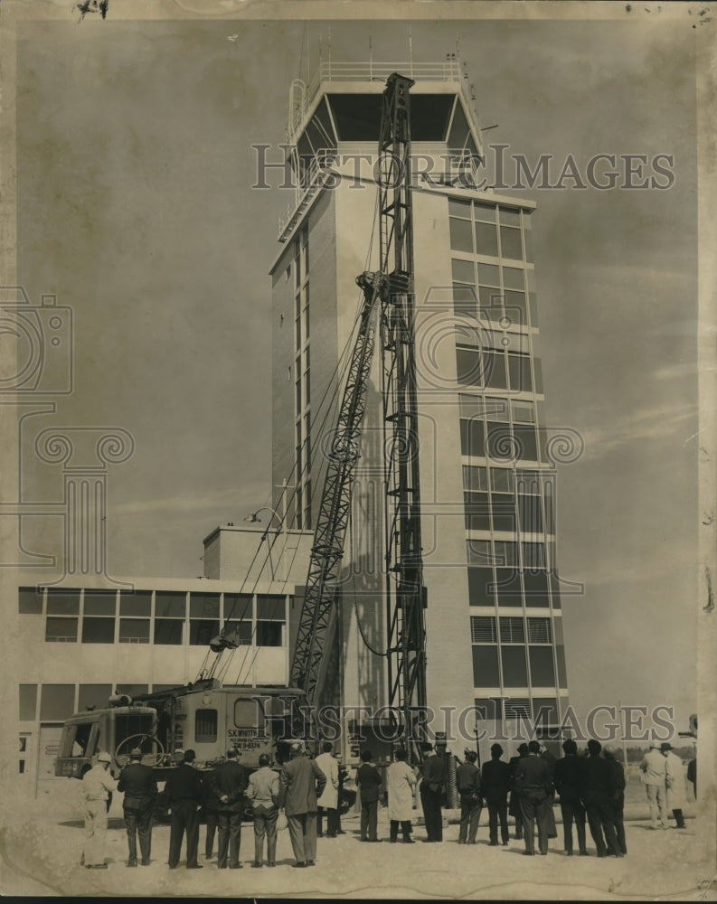 Piledriving ceremonies at North Pier of the airport as work begins.-Historic Images