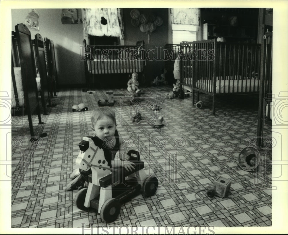 1991 Press Photo Child plays at Enchanted World Daycare Center in Metairie - Historic Images