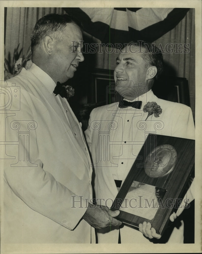 1965 Dr. Morrison, presenting Councilman Fitzmorris Jr.with plaque. - Historic Images