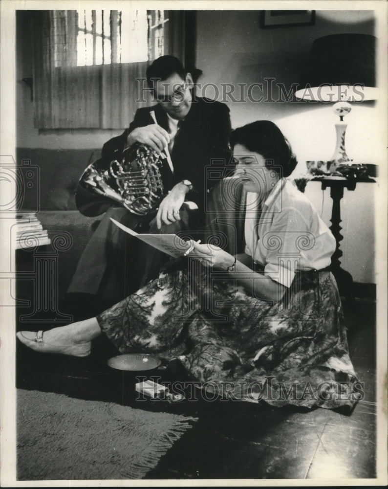 1960 Robert Elworthy and Maxine Elworthy, look over music - Historic Images