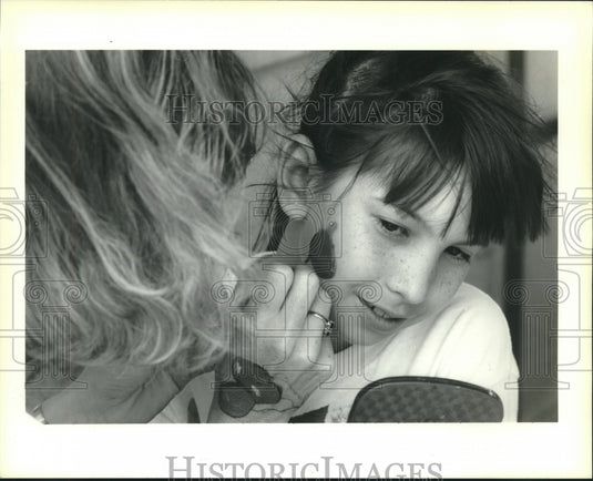 1991 Press Photo Jessica Paz gets "tomatoe" painted on face, Tomatoe Festival - Historic Images