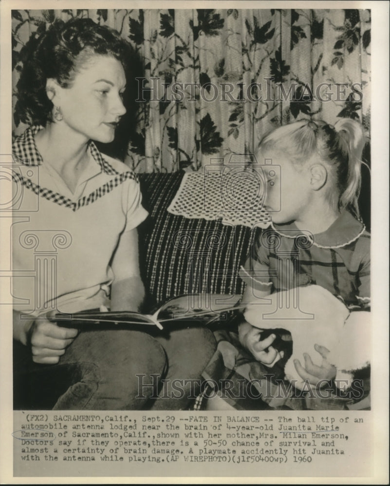 1960 Juanita Emerson suffers from brain injury, sits with her mother - Historic Images